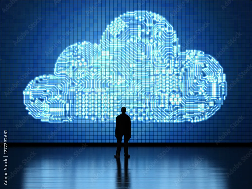 Person standing in front of a glowing digital cloud
