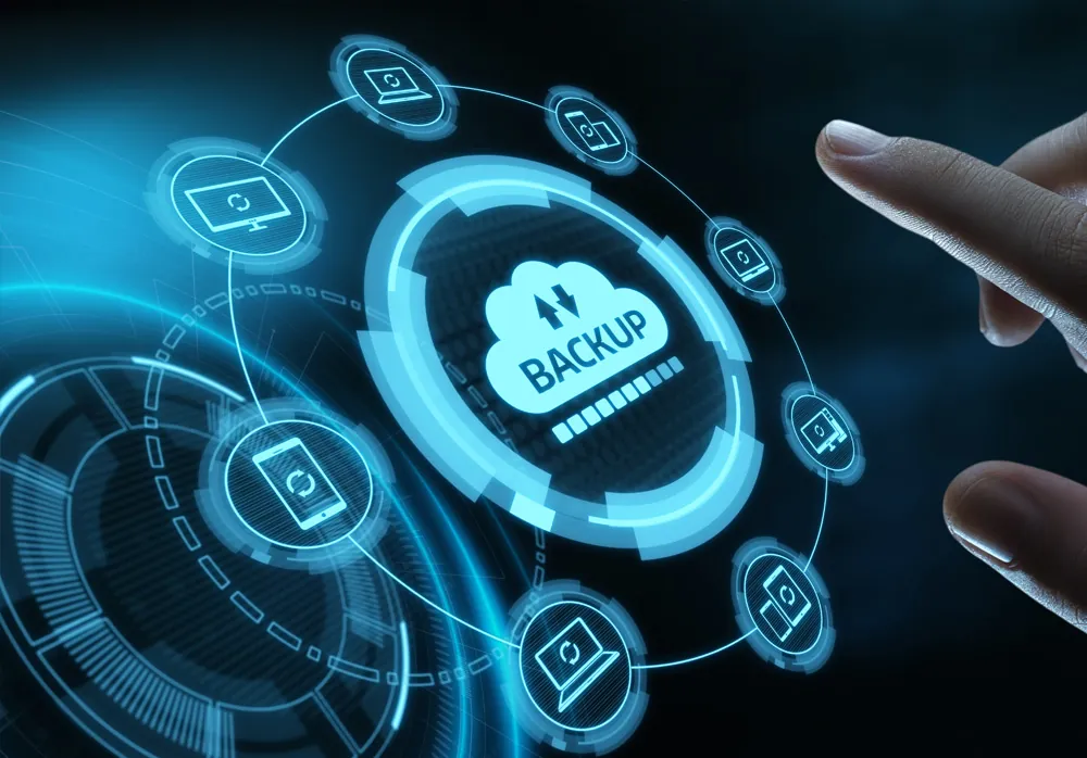 Hand touching a glowing cloud backup graphic