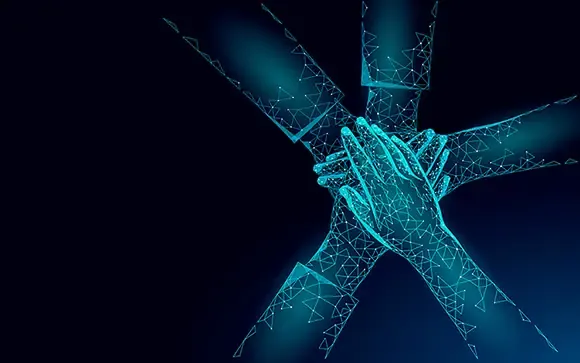 Hands stacked together in a glowing digital network