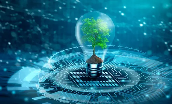 Light bulb with a young plant growing inside, on a circuit board